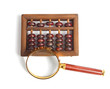 Chinese abacus and Magnifying glass,business concept