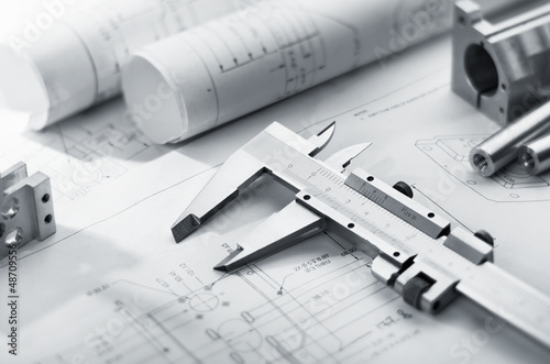 Photo: caliper on blueprint caliper on blueprint