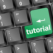tutorial or e learning concept with key on computer keyboard