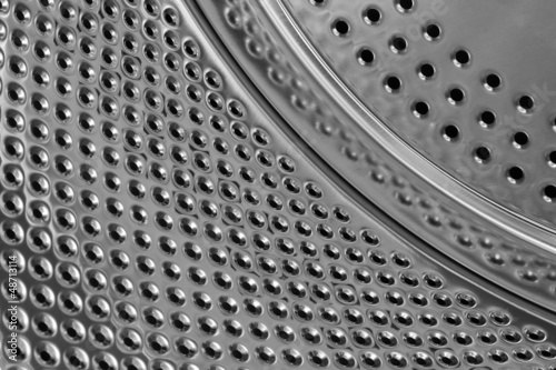 Photo: washing machine drum metal texture background washing machine drum metal texture background