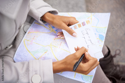 Photo: Sending a letter to her family Sending a letter to her family