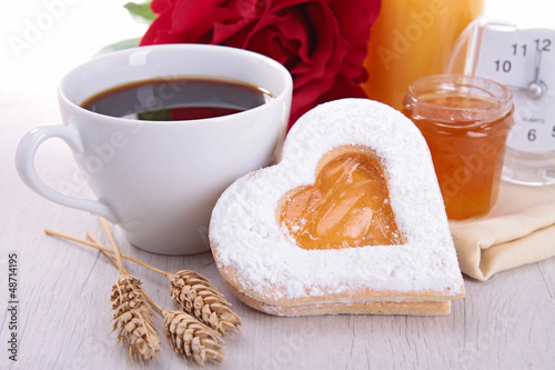 Photo: coffee and heart shape biscuit coffee and heart shape biscuit