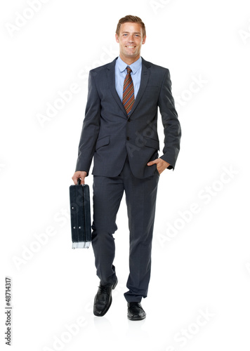 Photo: Walking to work with a smile on his face Walking to work with a smile on his face