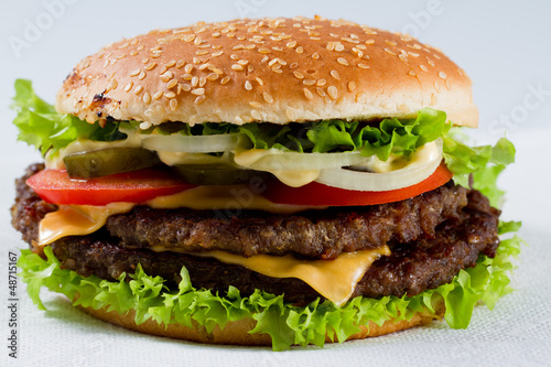 Photo: Hamburger - burger with grilled beef and vegetabes Hamburger - burger with grilled beef and vegetabes