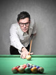 man playing pool