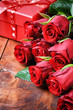 Photo: Bouquet of red roses and gift box Bouquet of red roses and gift box