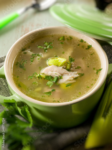 Photo: soup with chicken and leek, selective focus soup with chicken and leek, selective focus