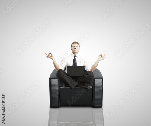 Photo: businessman meditating businessman meditating