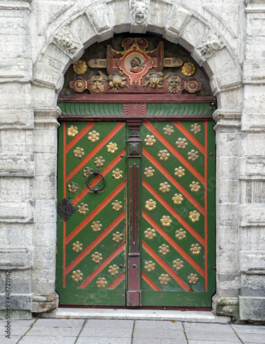 Photo: Green antique door texture with plaster wall around Green antique door texture with plaster wall around