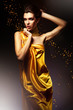 attractive woman in yellow dress