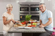 Man Woman Couple Making Sandwiches in Kitchen