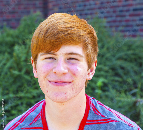 Photo: smart boy with red hair smart boy with red hair