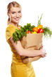 woman holding a shopping bag full of groceries, mango, salad,  r