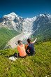 Photo: Hiker take a rest during hiking in Caucasus mountains, Georgia Hiker take a rest during hiking in Caucasus mountains, Georgia