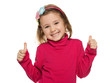 Photo: Cheerful little girl in red with her thumbs up Cheerful little girl in red with her thumbs up