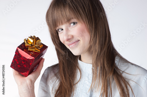 Photo: blonde woman holding giftbox blonde woman holding giftbox