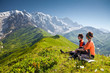 Photo: Hiker take a rest during hiking in Caucasus mountains, Georgia Hiker take a rest during hiking in Caucasus mountains, Georgia