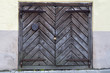 Photo: Old dark wooden door with brown iron inside Old dark wooden door with brown iron inside