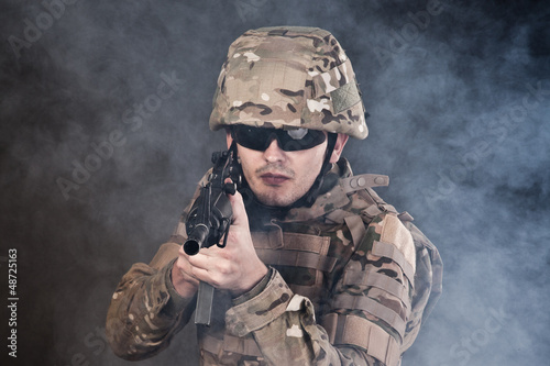 Photo: Modern soldier with rifle Modern soldier with rifle
