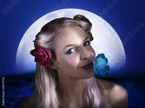 Photo: Happy Woman At Moon Light Beach Party Happy Woman At Moon Light Beach Party