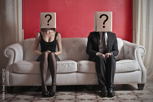 Photo: couple sitting on sofa couple sitting on sofa