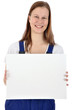 Junge Handwerkerin mit leerem Schild