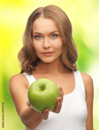 Photo: woman with green apple woman with green apple