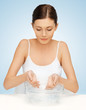 woman washing her face
