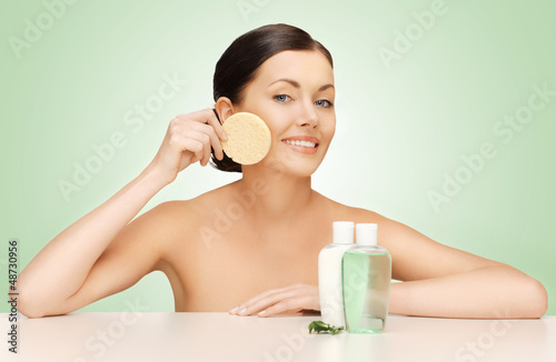 Photo: woman with sponge woman with sponge