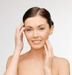 face and hands of beautiful woman