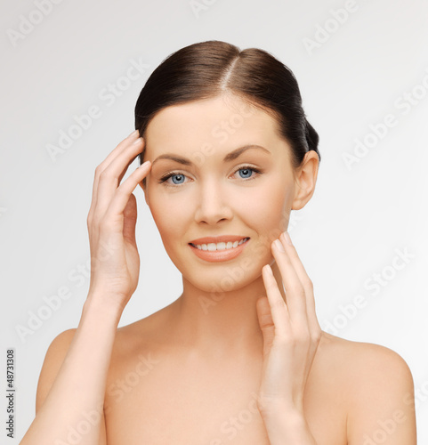 Photo: face and hands of beautiful woman face and hands of beautiful woman