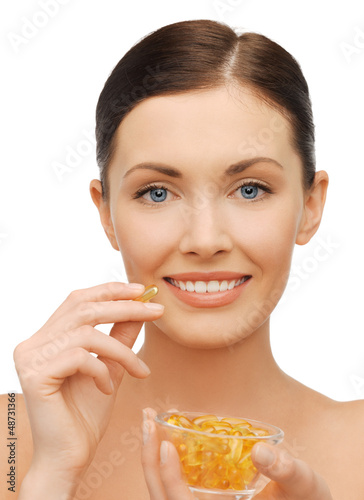 Photo: woman with vitamins woman with vitamins