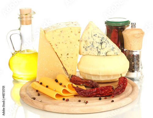 Photo: Various types of cheese isolated on white Various types of cheese isolated on white