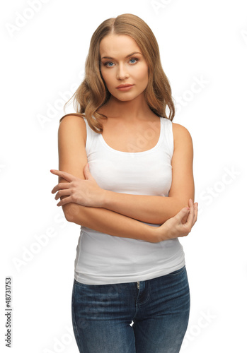 Photo: calm and serious woman in blank white t-shirt calm and serious woman in blank white t-shirt