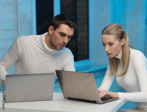 Photo: man and woman in laboratory man and woman in laboratory