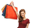 Photo: teenage girl in red dress with shopping bags teenage girl in red dress with shopping bags