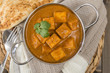 Paneer Butter Masala - Indian curd cheese curry in a balti dish.