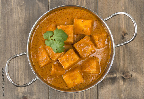Photo: Paneer Butter Masala - Indian curd cheese curry in a balti dish. Paneer Butter Masala - Indian curd cheese curry in a balti dish.