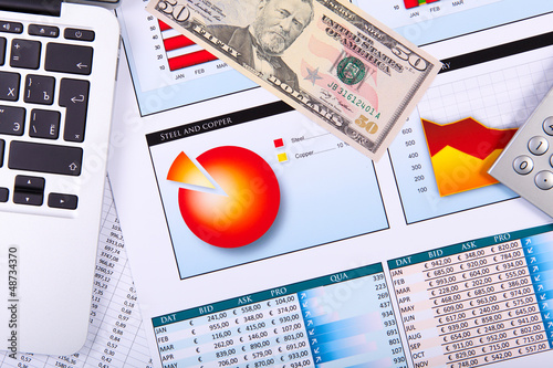 Photo: Financial papers on the table Financial papers on the table