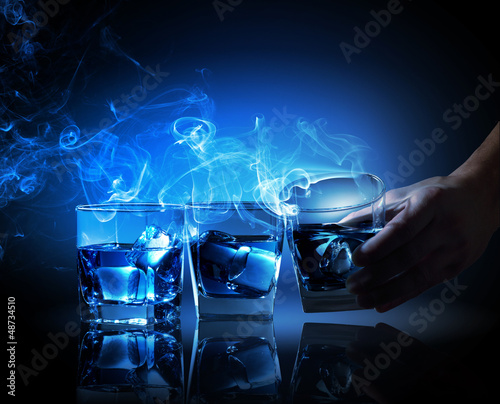 Photo: Three glasses of blue cocktail Three glasses of blue cocktail