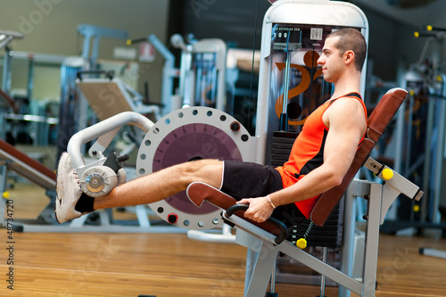 Photo: Man lifting weights Man lifting weights