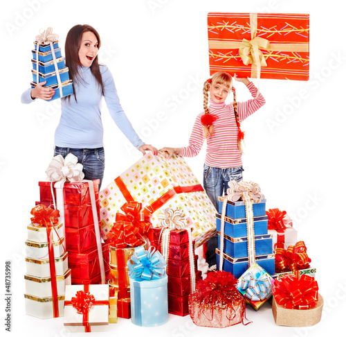 Photo: Happy family with child and group gift box. Happy family with child and group gift box.