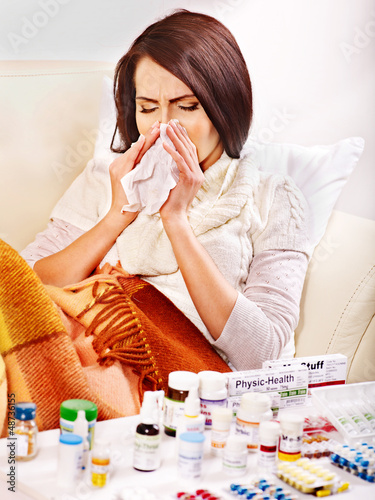 Photo: Woman having pills and tablets. Woman having pills and tablets.