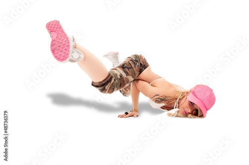 Photo: Female Break dancer performing freeze Female Break dancer performing freeze