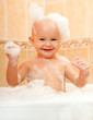 happy joyful kid in a bath