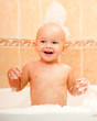happy joyful kid in a bath