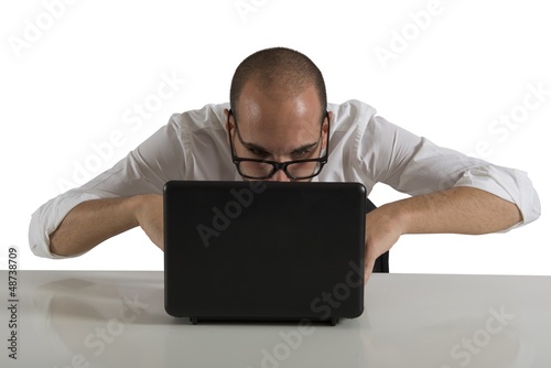 Photo: Businessman works with computer Businessman works with computer