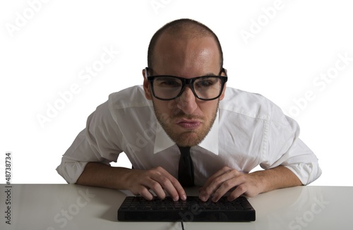 Photo: Businessman works with computer Businessman works with computer
