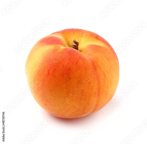 Photo: One ripe peach in closeup One ripe peach in closeup