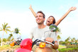 Happy free freedom couple driving scooter